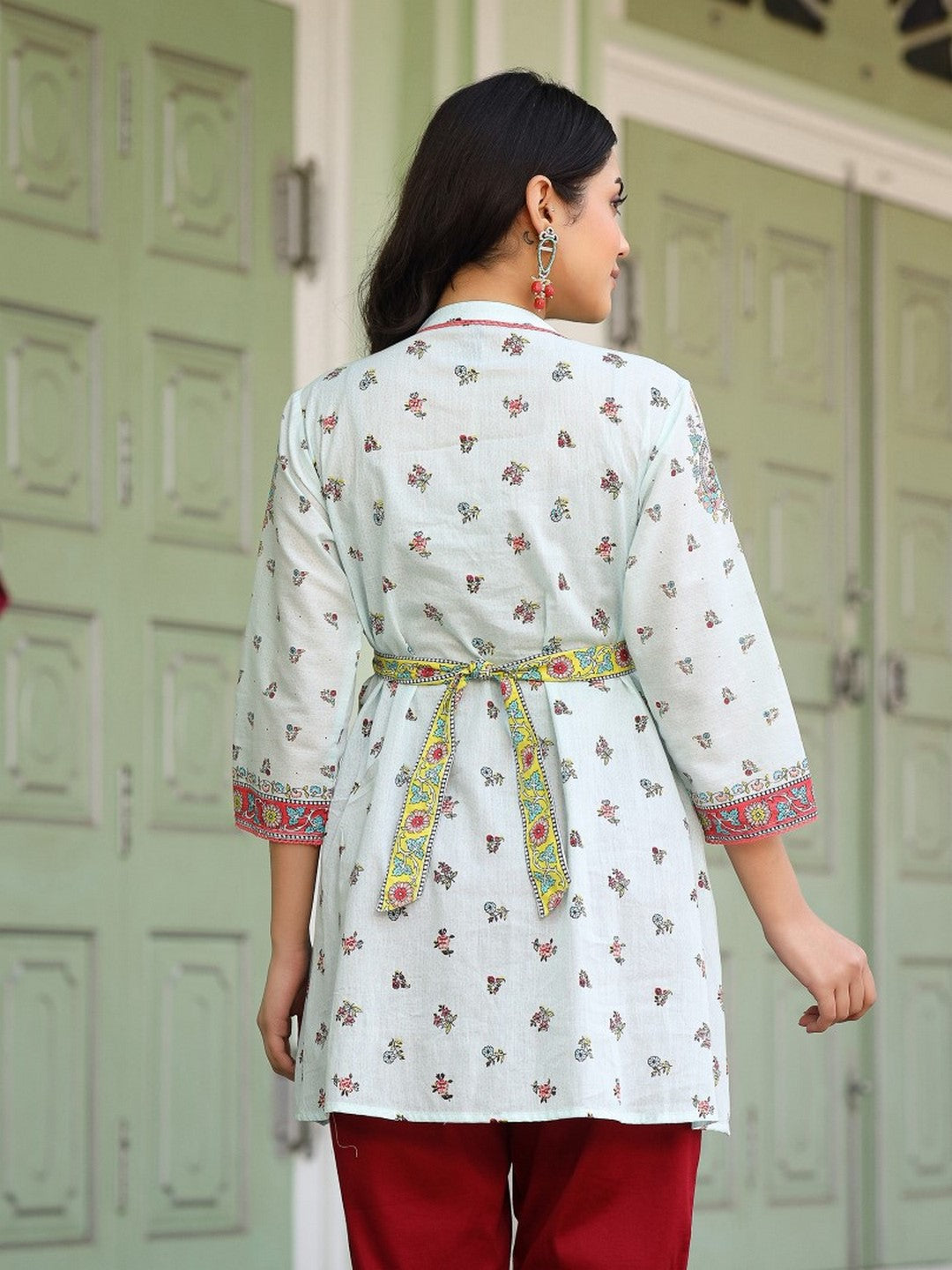 Women Sky Blue Cotton Floral Printed Lacy Peplum Tunic With Tie-Up At Back