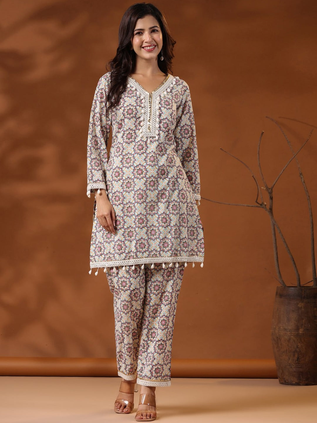 straight Style Cotton Fabric Multi Color Floral Printed Kurta And Bottom With Cowrie Shell Work