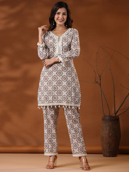 straight Style Cotton Fabric Multi Color Floral Printed Kurta And Bottom With Cowrie Shell Work