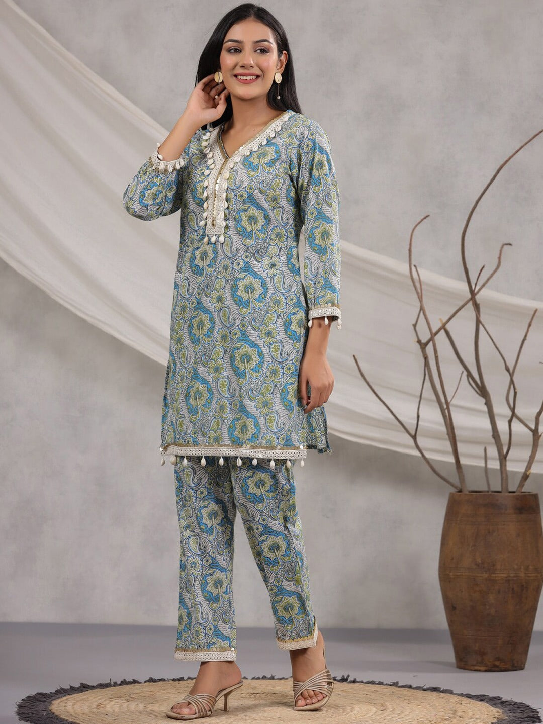 straight Style Cotton Fabric Blue Color Floral Printed Kurta And Bottom With Cowrie Shell Work