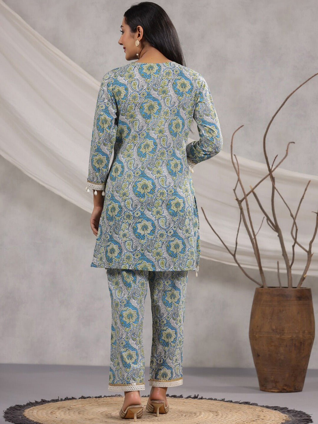 straight Style Cotton Fabric Blue Color Floral Printed Kurta And Bottom With Cowrie Shell Work