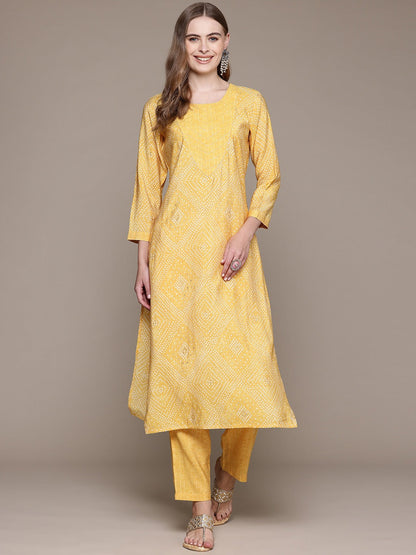 Straight Style Silk Fabric Yellow Color Kurta With Bottom