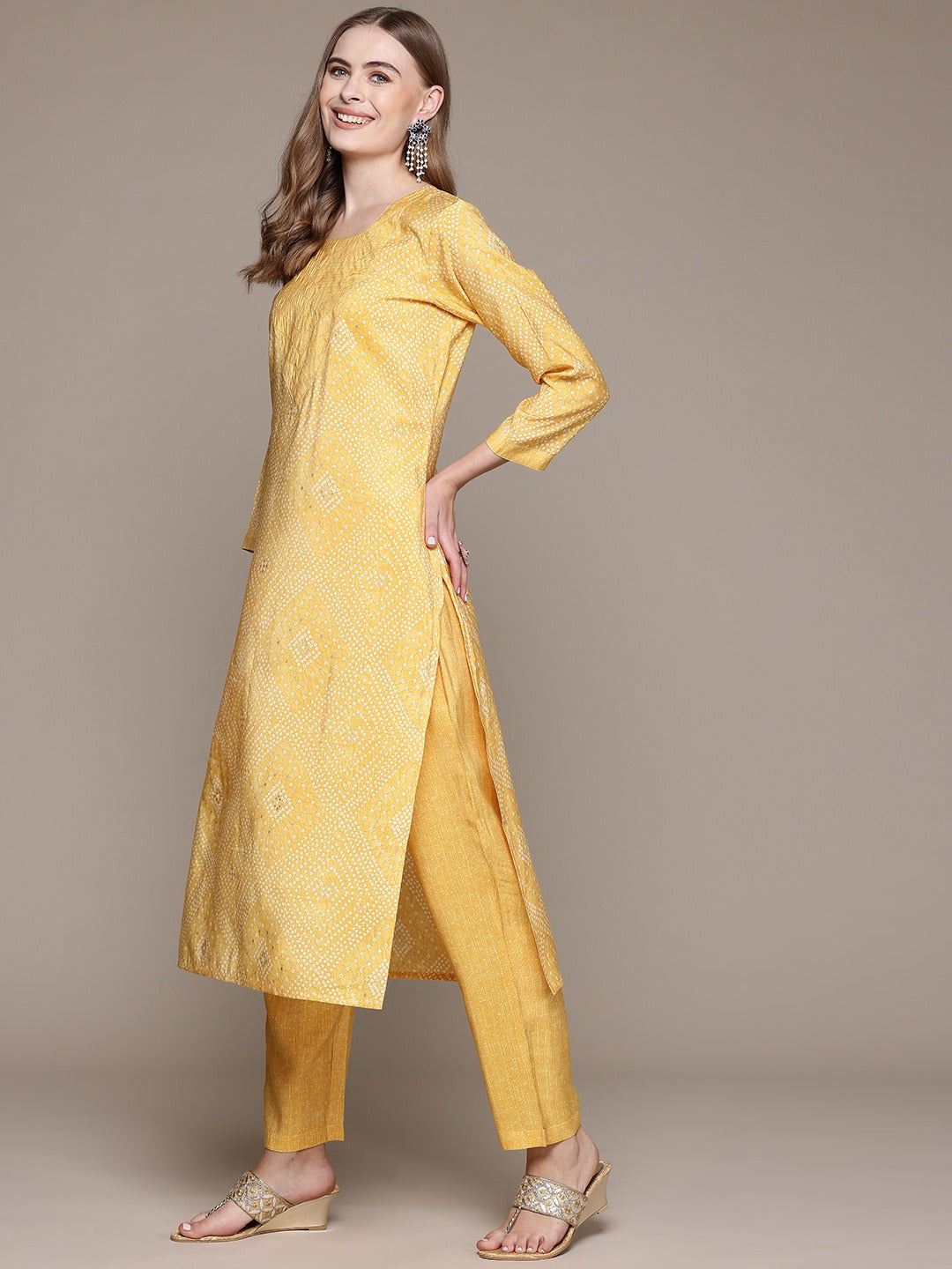 Straight Style Silk Fabric Yellow Color Kurta With Bottom