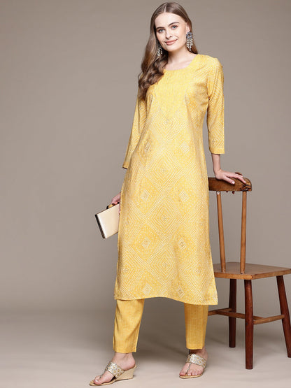 Straight Style Silk Fabric Yellow Color Kurta With Bottom