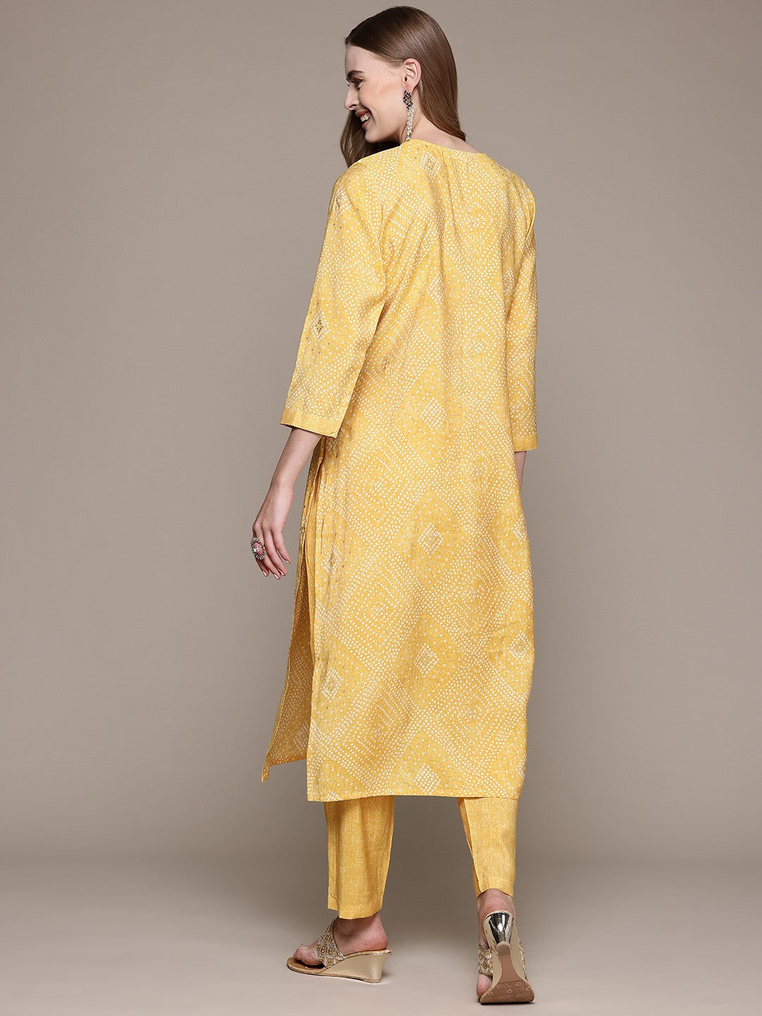 Straight Style Silk Fabric Yellow Color Kurta With Bottom