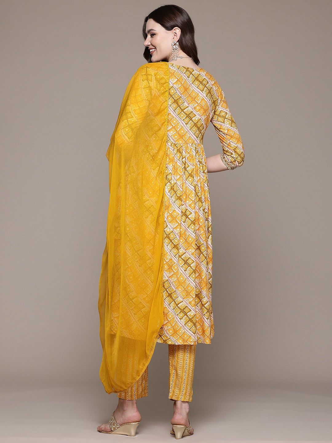 Flared style Rayon fabric Mustard color kurta with Bottom and Dupatta