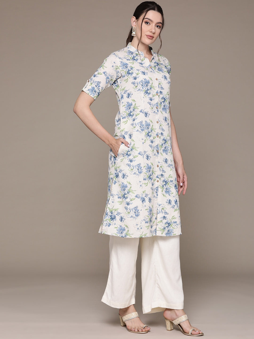 A Line Style Cotton Fabric Blue Color Kurti With Floral Printed Work