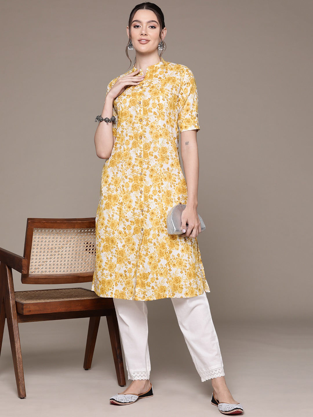 A Line Style Cotton Fabric Mustard Color Kurti With Floral Printed Work