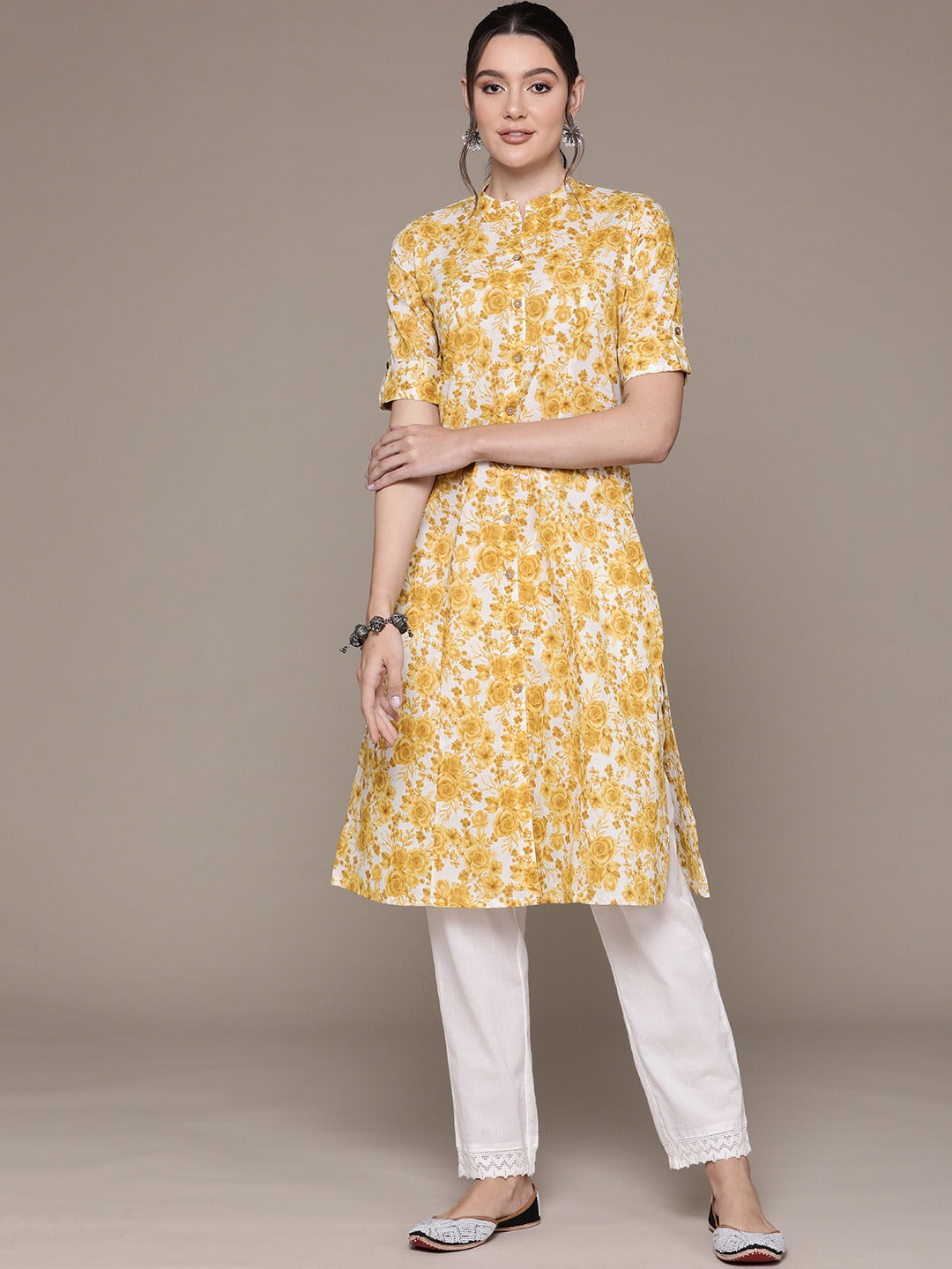 A Line Style Cotton Fabric Mustard Color Kurti With Floral Printed Work