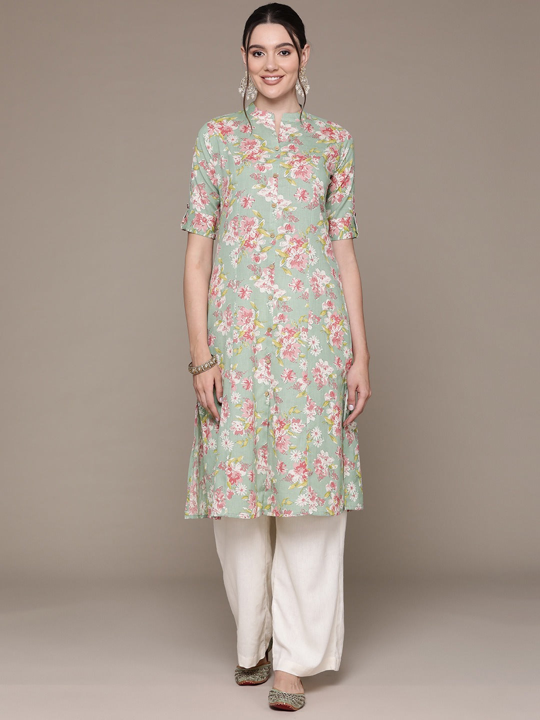 A Line Style Cotton Fabric Green Color Kurti With Floral Printed Work