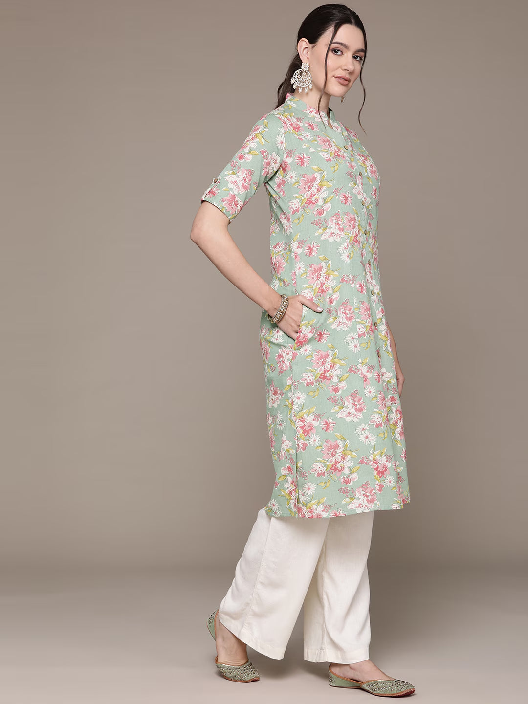 A Line Style Cotton Fabric Green Color Kurti With Floral Printed Work