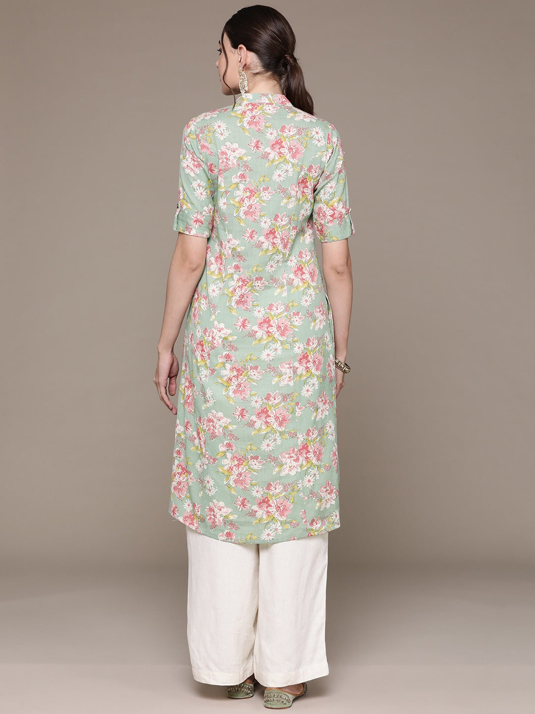 A Line Style Cotton Fabric Green Color Kurti With Floral Printed Work