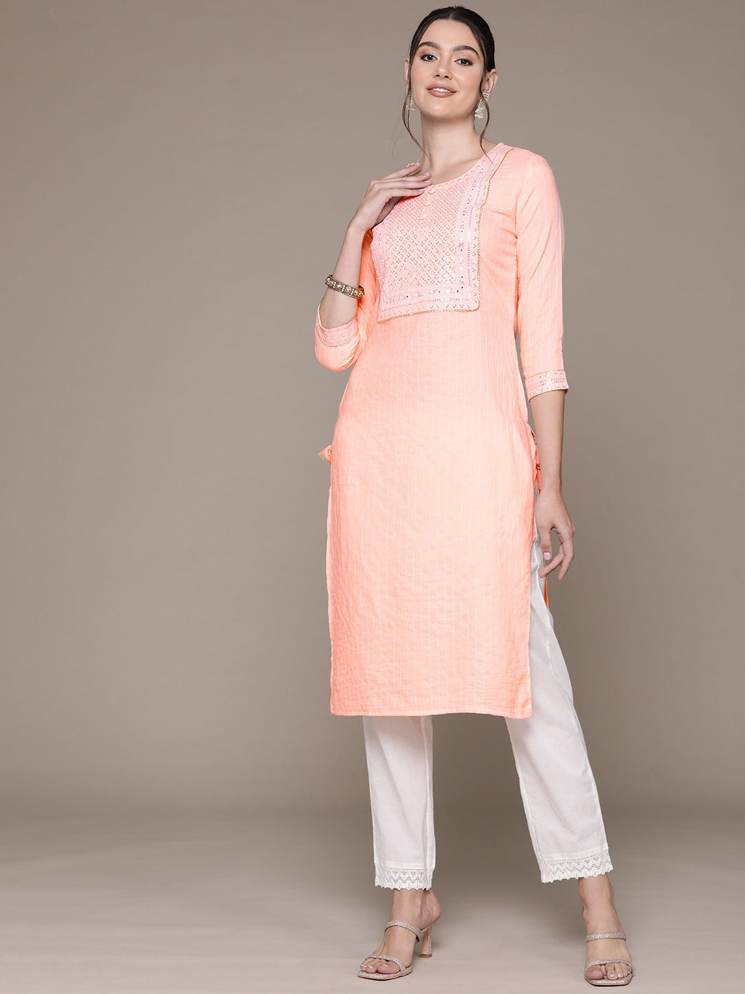 Straight Style Rayon Fabric Peach Color Kurti With Sequence & Embroidered Work