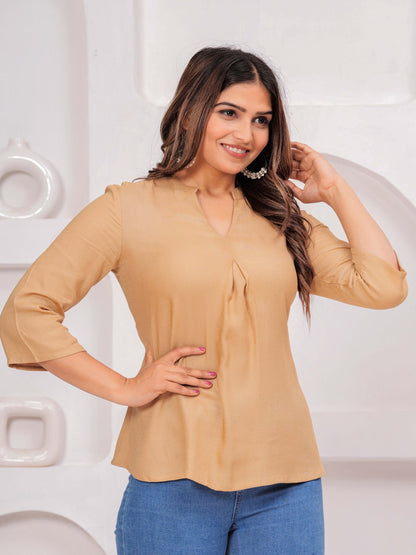 Cream Solid Tops & Tunic - Viscose Moss Fabric, 3/4 sleeves, V-neck collar and hips Length.