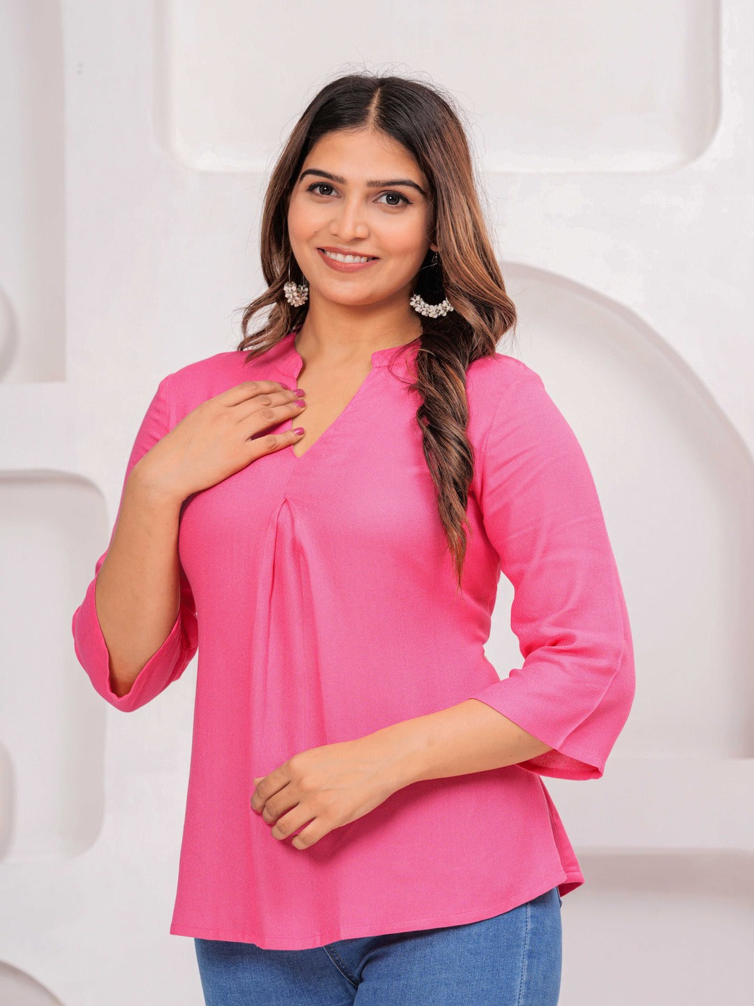 Pink Solid Tops & Tunic - Viscose Moss Fabric, 3/4 sleeves, V-neck collar and hips Length.