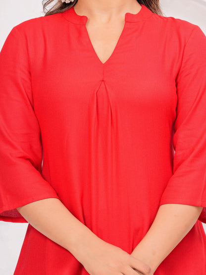 Red Solid Tops & Tunic - Viscose Moss Fabric, 3/4 sleeves, V-neck collar and hips Length.