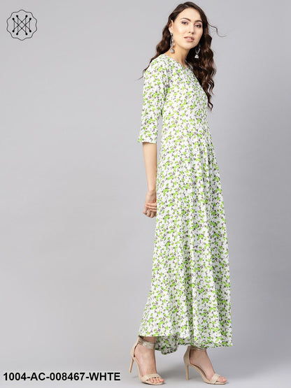 White And Green Floral Printed Round Neck 3/4Th Sleeves Flared Maxi With Deep Back And Tassels Detailing