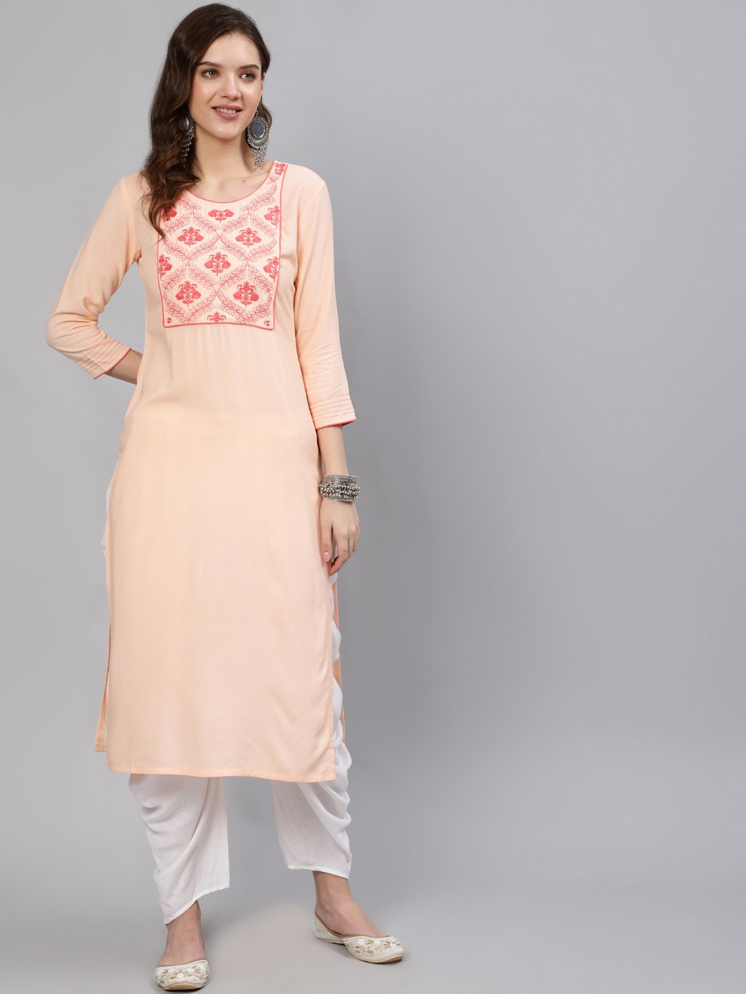 Women Peach Embroidered Straight Kurta With Three Quarter Sleeves