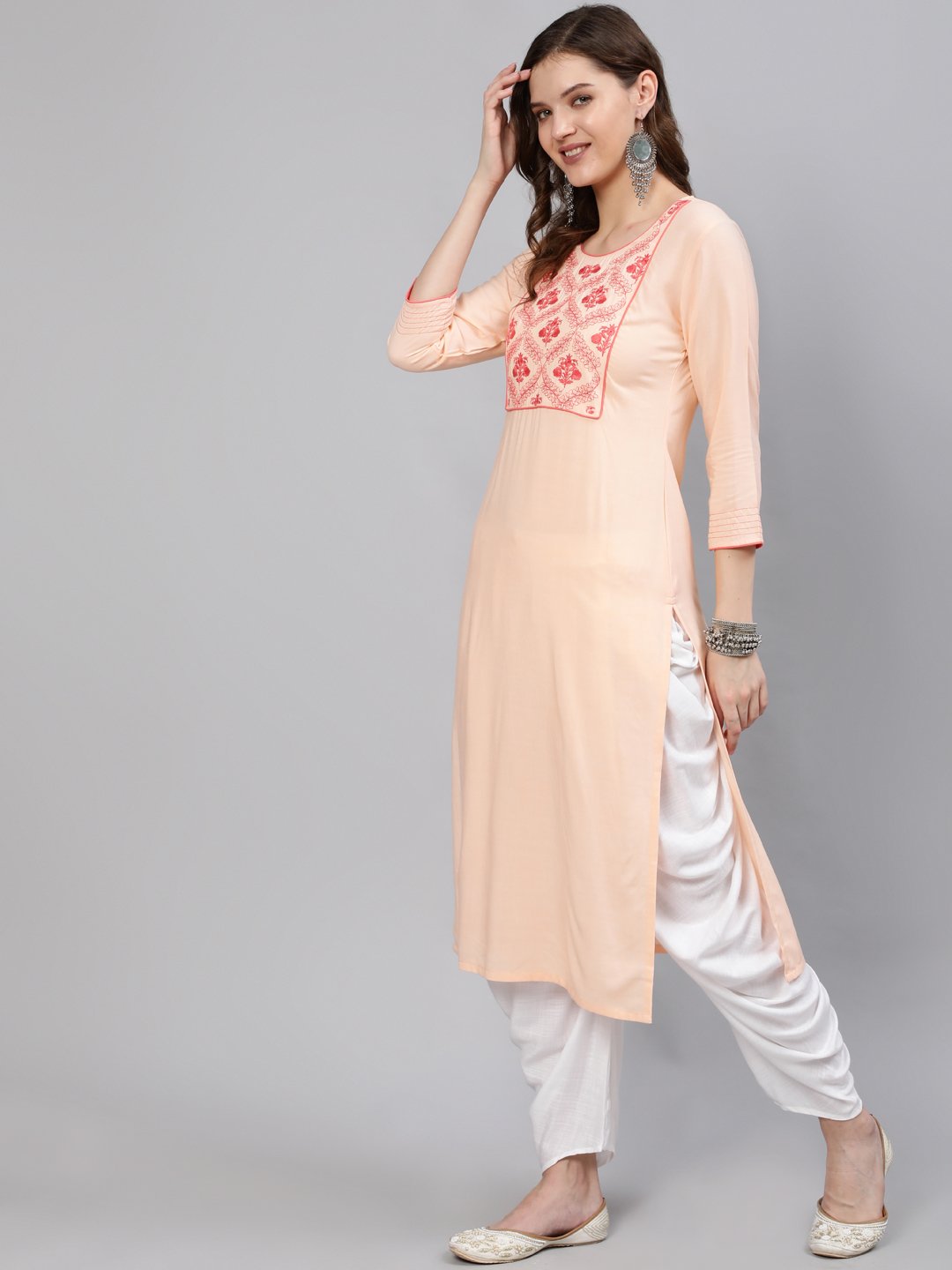 Women Peach Embroidered Straight Kurta With Three Quarter Sleeves