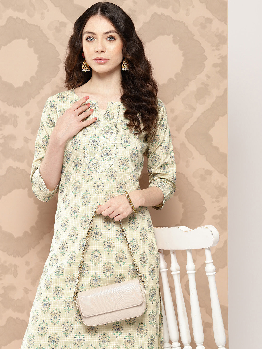 Women Cream Printed Straight Kurta With Three Quarter Sleeves