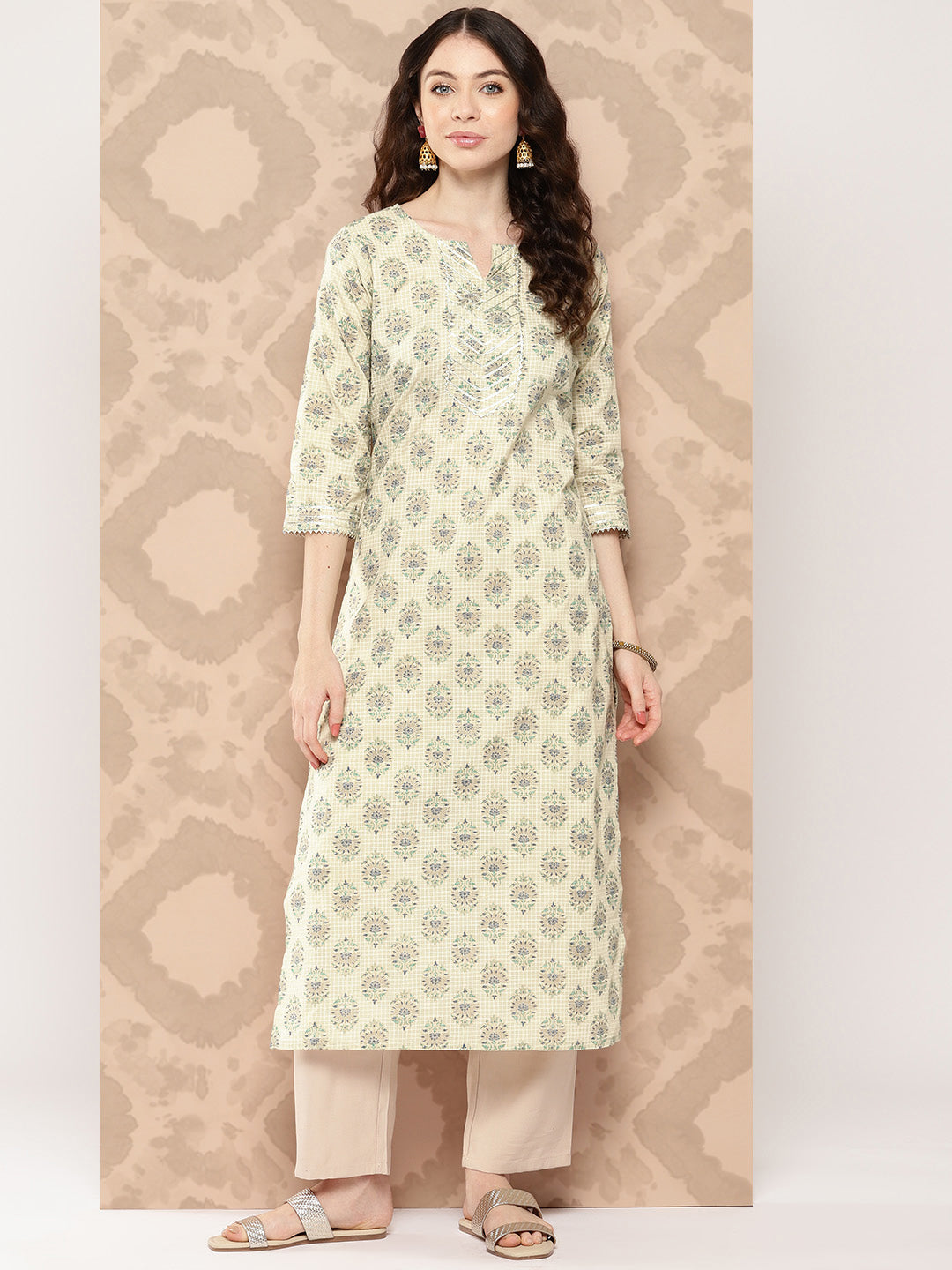 Women Cream Printed Straight Kurta With Three Quarter Sleeves