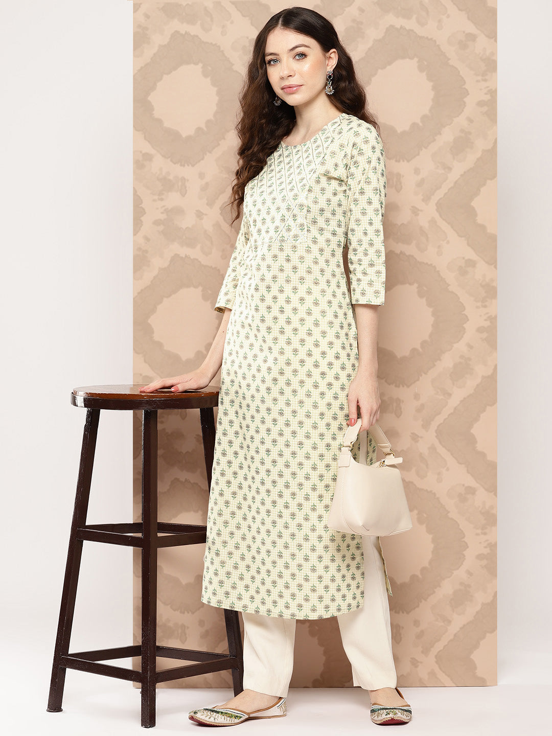 Women Cream Printed Straight Kurta With Three Quarter Sleeves