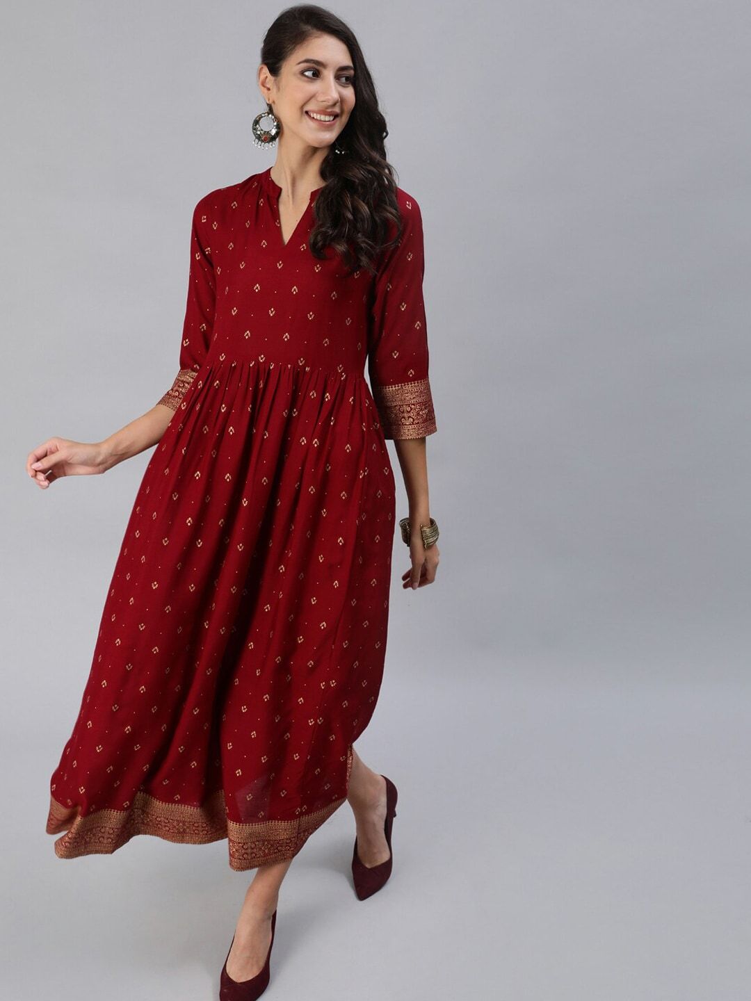 Women Maroon & Gold Printed Maxi Dress With Three Quarter Sleeves