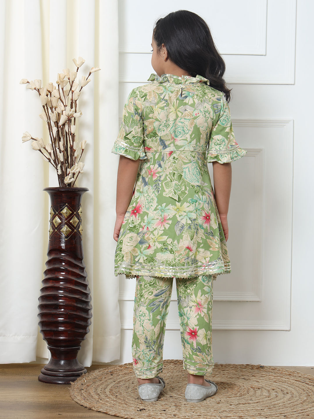 A Line Style Rayon Fabric Green Color Kurti With Pyjama