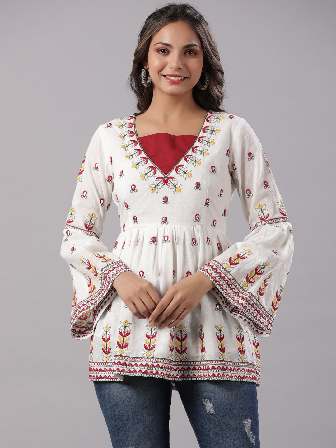 White Cotton Dobby Embroidered Peplum Tunic