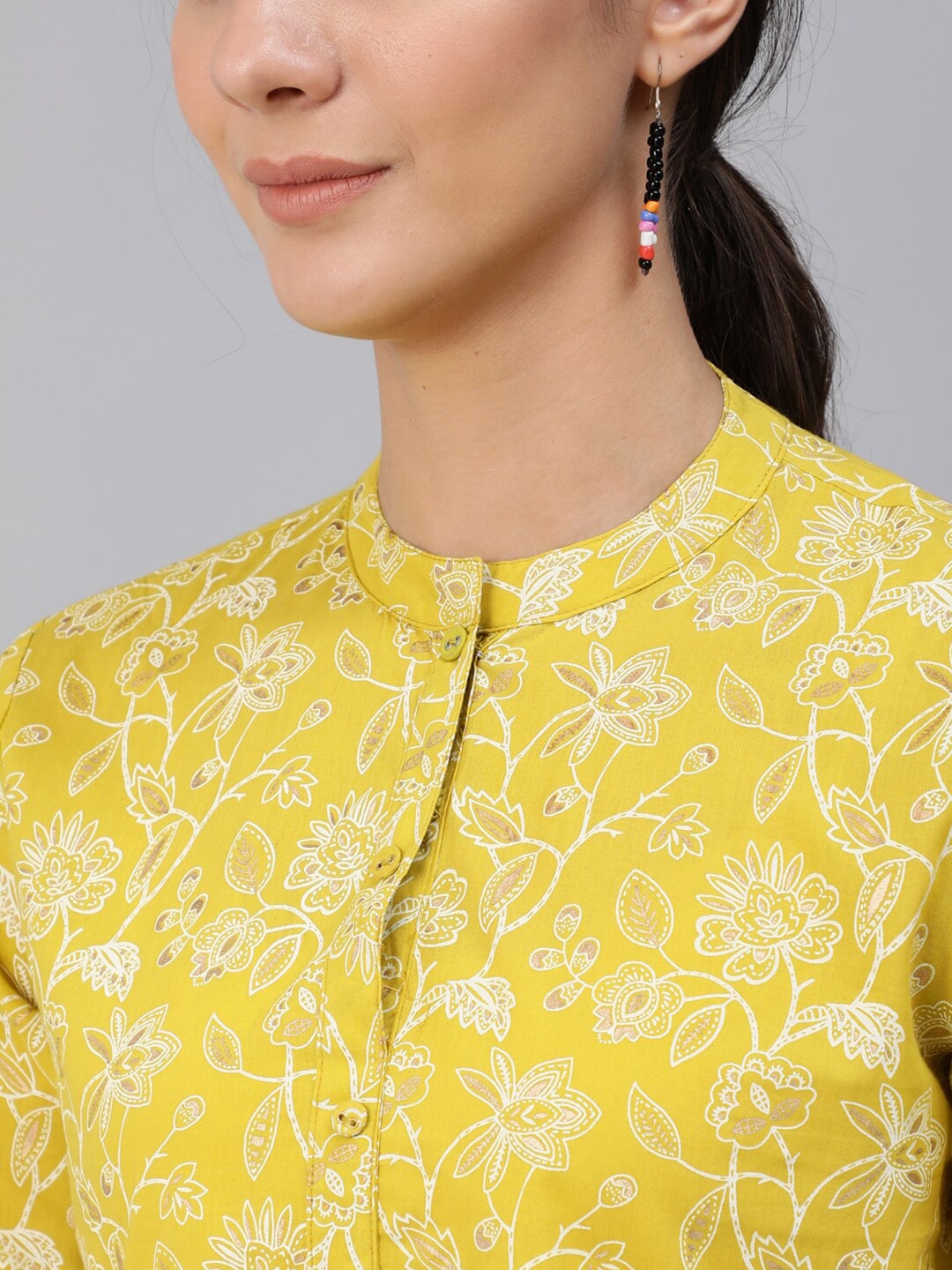 Women Green & Gold Printed Top With Three Quarter Flared Sleeves